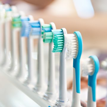 Electric toothbrush heads in a row